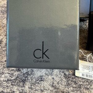 Calvin Klein Gray Box with ring full inclusion COA